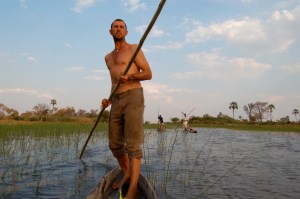 Poling a mokoro (traditional canoe) in Botswana's Okavango Delta